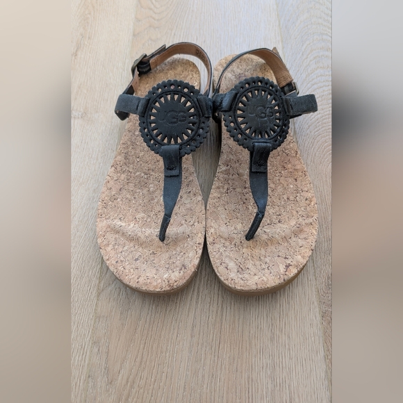 UGG Shoes - Like new/UGG Black T-Strap Cork Footbed Sandals with Medallion Accent